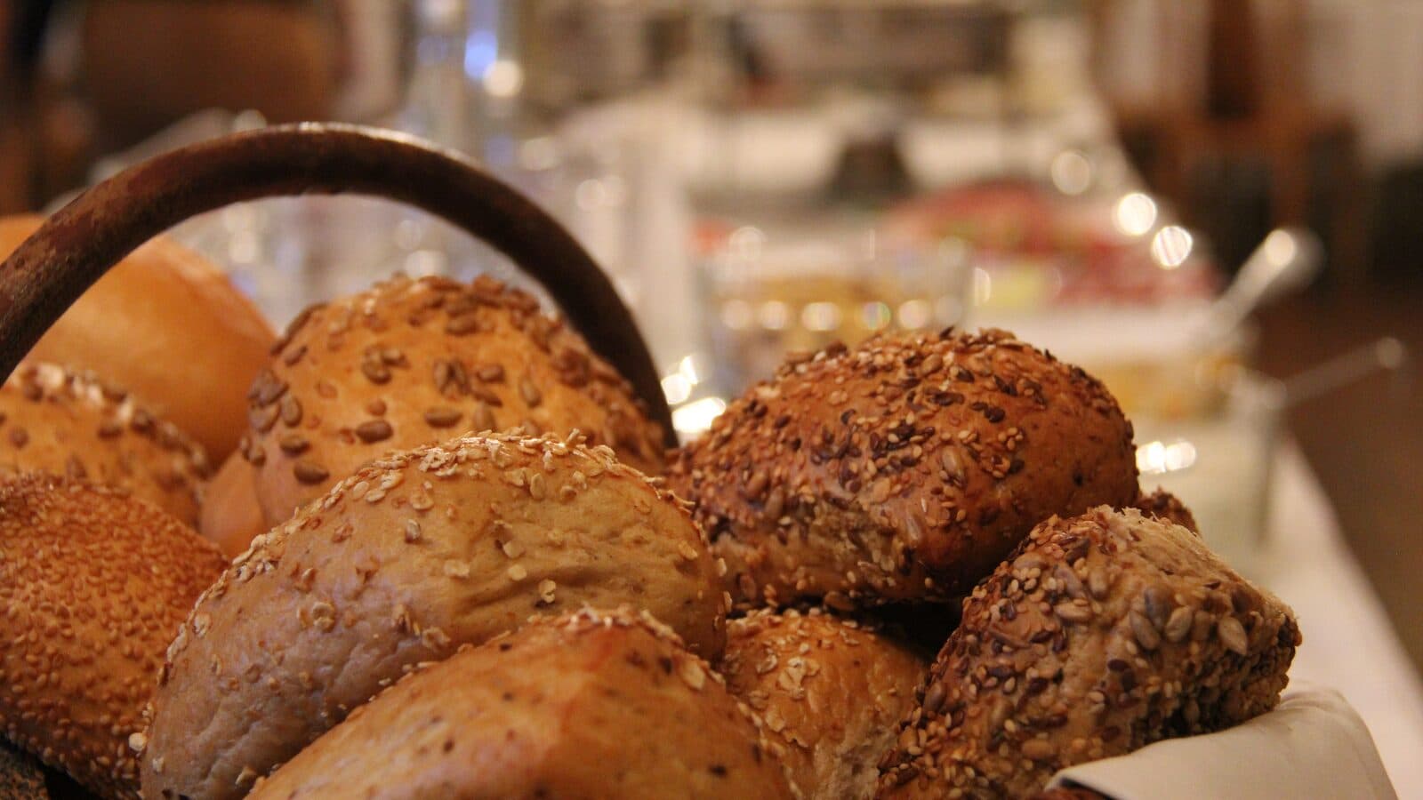 Basket of grain and sesame rolls on the breakfast table at Das Vitalhotel Schulenberg